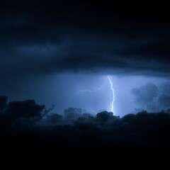 The night was dark, the sky was dark, the clouds were black, and the lightning flashed in a long line.
