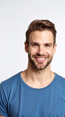 Obraz premium A cheerful man with neatly trimmed short hair and a well-groomed beard, wearing a casual shirt, smiles warmly, exuding a friendly and approachable vibe.