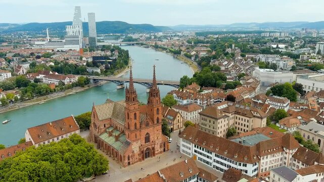 Basel, Switzerland. Basel Cathedral. Basel is a city on the Rhine River in northwestern Switzerland, near the borders with France and Germany. Drone footage, Point of interest