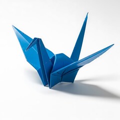 Vibrant blue origami crane, an artful symbol of peace and hope, meticulously folded, ideal for projects seeking a serene Blue Background aesthetic or minimalist visual impact