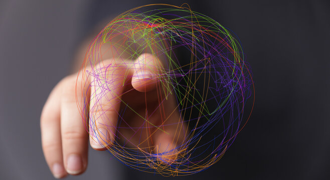 Hand touching a 3D digital sphere made of colorful lines, representing global network, connection, innovation and technology. - Powered by Adobe