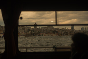 view from a boat of the sea and the city