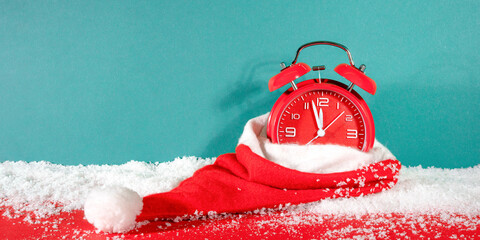 Christmas sale xmas shopping banner design. Christmas sale text in seasonal holiday discount offer with countdown alarm clock in santa hat in snow, shop promotion ads.