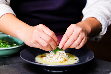 Japanese chef makes noodles