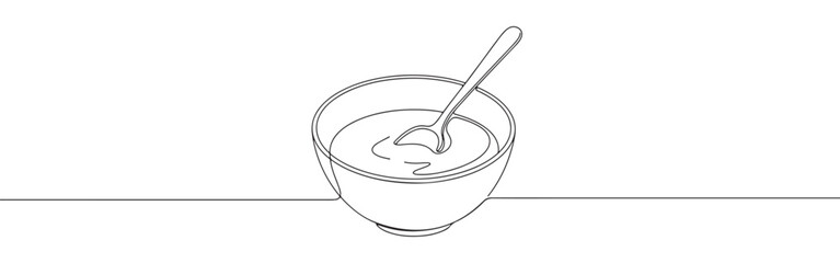 Continuous one line drawing of a bowl with a spoon. Concept of food, eating and healthy lifestyle