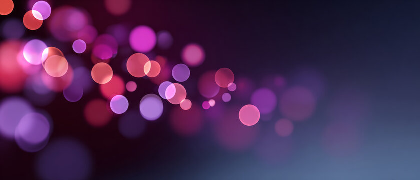 Abstract bokeh background with soft glowing pink and purple circles on dark gradient backdrop, creating dreamy and vibrant light effects