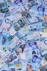 Money background, currency, paper banknotes from different countries. Money cash currency, blue