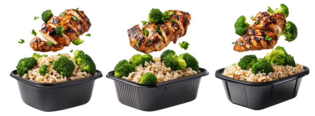 Healthy grilled chicken, brown rice, and broccoli flying in black plastic meal container isolated on white transparent background