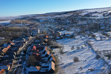  Aerial view of mountain village at winter by drone
