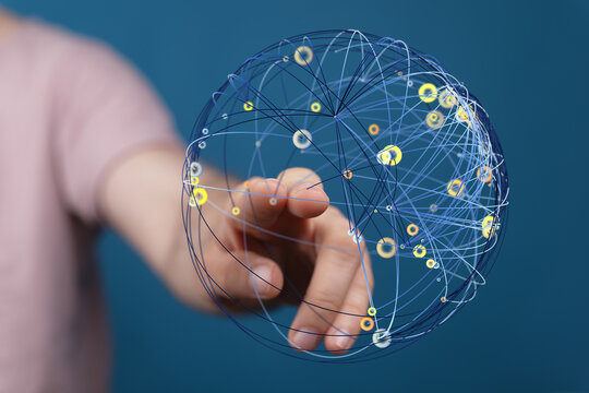 Hand touching a 3D digital network globe, symbolizing global connections, data transfer, and communication. Perfect for technology, i