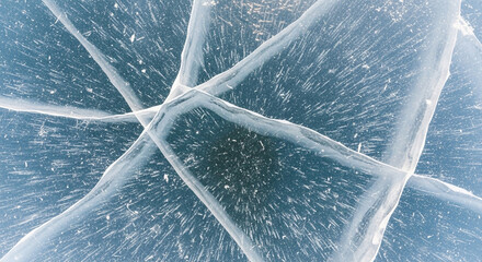 Cracked ice surface with frozen air bubbles, creating a unique texture