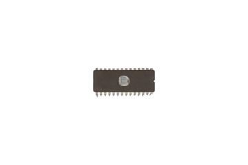 Vintage integrated EPROM circuit chip with exposed quartz window is isolated.