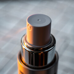Obraz premium Macro Close-Up of Metallic Cosmetic Pump Dispenser Cap Mockup