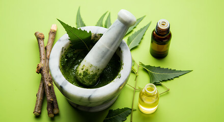 Neem preparation in mortar with leaves and oil for ayurvedic medicine