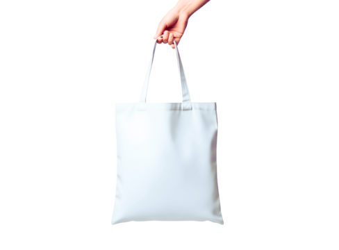 Hand holding a white tote bag isolated on transparent background