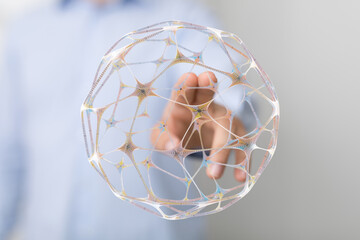Abstract image of hand touching a digital sphere, concept of connection, technology, artificial intelligence, and the global network.