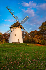 The Egelsberg Mill ia a Dutch-style tower windmill in Krefeld-Traar (Germany). Romantic sunset atmosphere in fall season with silhouette of iconic landmark and historic monument.