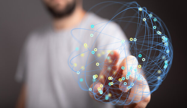 Close-up of hand touching digital globe symbolizing global network, business, innovation, future and connection.