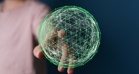 Concept of global network and connections. Person holds a glowing green digital sphere, representing communication and the internet. Ideal for t