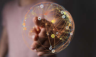 Abstract image showing a hand touching a network globe. Representing communication, technology, and global connections. Suitable for
