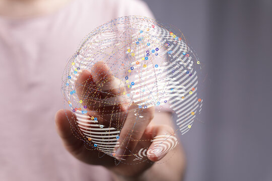 Hand touching a 3D digital globe representing the global network, the concept of connection, technology, innovation and futuristic co