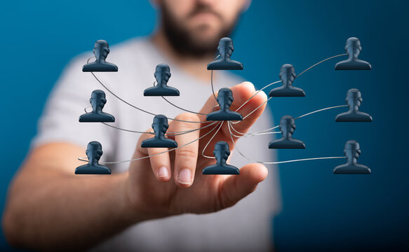 Person points to digital organization concept representing teamwork, communication, and connections. Modern business and technological advanceme