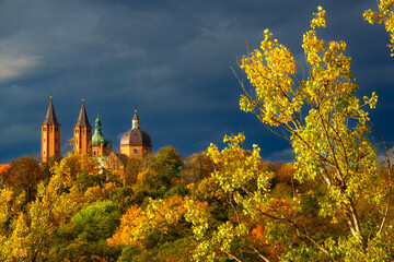 Plock Cathedral in autumn landscape. Plock, Poland
