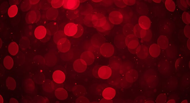 Abstract red bokeh background with sparkling lights and subtle dust particles, creating a festive and magical atmosphere for design