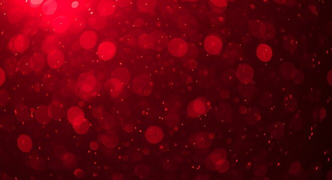 Abstract red bokeh background with sparkling lights and subtle dust particles, creating a festive and magical atmosphere for design