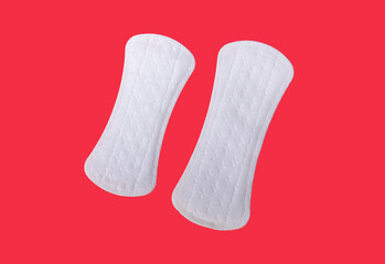 Feminine hygiene pads on vibrant background for health and wellness