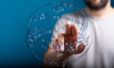 Close up view of a person's finger touching a digital interface with data visualization. Represents technology, internet and innovati