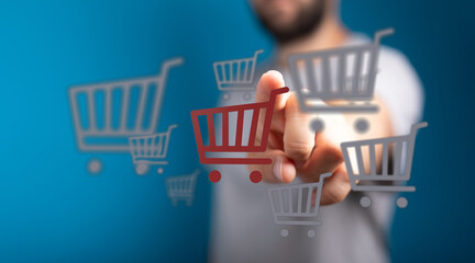Person interacting with shopping carts, online shopping and e-commerce concept. Futuristic...
