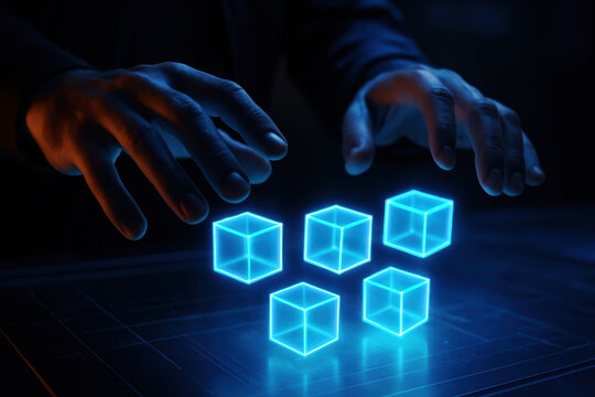 Futuristic glowing cubes hover above a dark surface hands gesture as if to manipulate digital blocks neon blue light