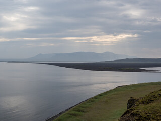 island, shore and rocks on the seashore in iceland