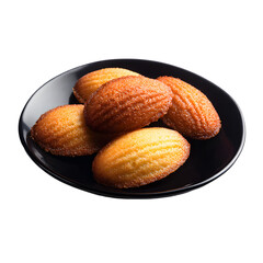 Elegant French Madeleines Displayed on Black Plate on White Background
