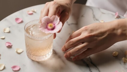 Elegant cocktail garnished with a delicate flower, artistic presentation.