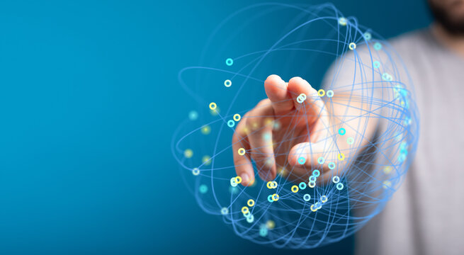 Hand touching a digital network sphere, representing global connection, technology, innovation. Concept of networking, business, futuristic conc - Powered by Adobe