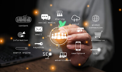 Person touching digital icons for marketing, SEO, cloud, and e-commerce, representing online communication, business technology, and data-driven advertising.