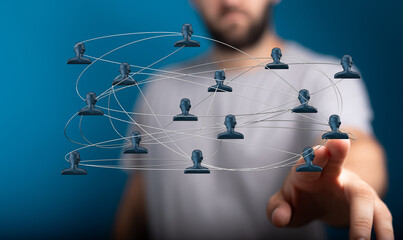 Visual representation of interconnected people, symbolizing teamwork, collaboration, and networking in a digital age.  Focus on communication an