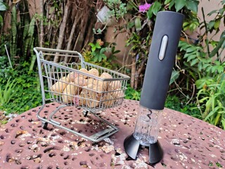 Wine Opener with a cart filed with wine corks at garden 