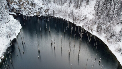 Scenic winter panorama of Kaindy Lake Almaty Kazakhstan