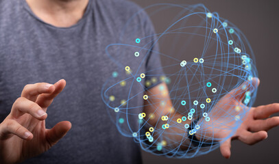 Close-up of a man's hands holding a digital globe illustrating concepts like global network,...