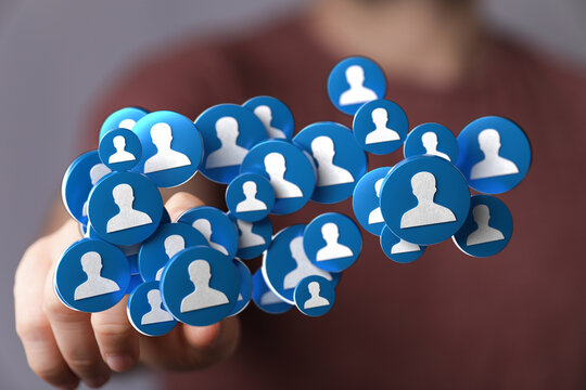 Abstract design with blue circles and person icons. Representing connections, teamwork, and unity in an online environment.