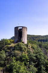 Esch-sur-Sure, Wiltz, Grand-Duche de Luxembourg, September 07, 2025, Weathered stone tower with scenic valley views, Historyrich medieval tower standing on forested hilltop with open