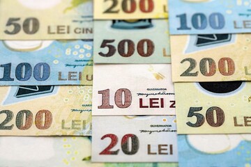 Romanian Leu currency money bills. RON currency banknotes in stack with different denomination...