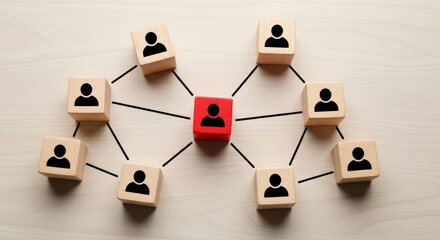 Wooden blocks with person icons connected in a network structure