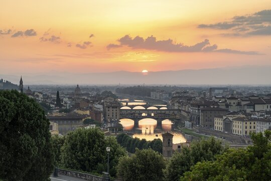 View from Piazzale Michelangelo, city view at sunset, Ponte Vecchio and Arno River, Florence, Tuscany, Italy