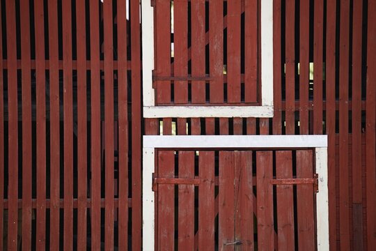 Falun red painted wooden slats of a barn, former paper factory and mill for the production of groundwood pulp board, UNESCO World Heritage Site Factory Village Verla, Maailmanperint&ouml;kohde Verlan puuhiomo ja pahvitehdas, Verla Rapids, Kymenlaakso, near Kouvola, Finland