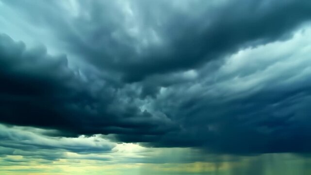 Overcast sky with dark, layered clouds suggesting a coming storm and possible rain