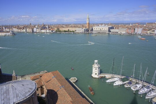 View from the tower of the San Giorgio Maggiore church to the lighthouse and across to St Mark's Square, Venice, Metropolitan City of Venice, Italy